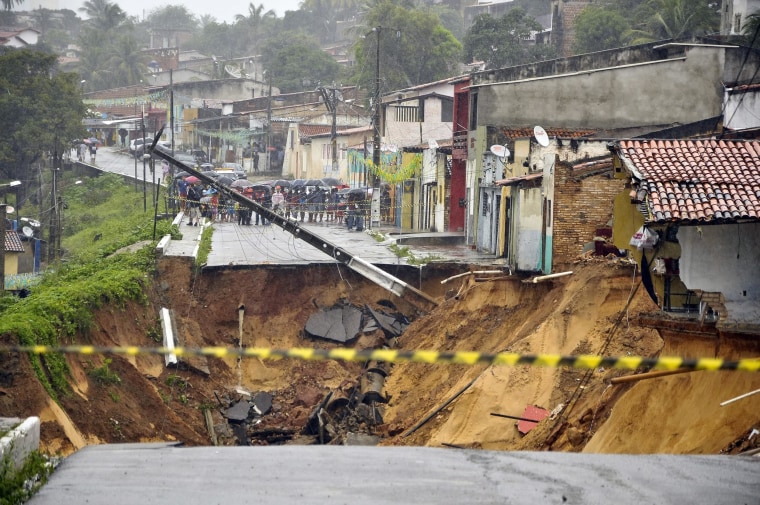 Image: Lhe aftermath of a landslide that destroyed several homes in Natal, Brazil