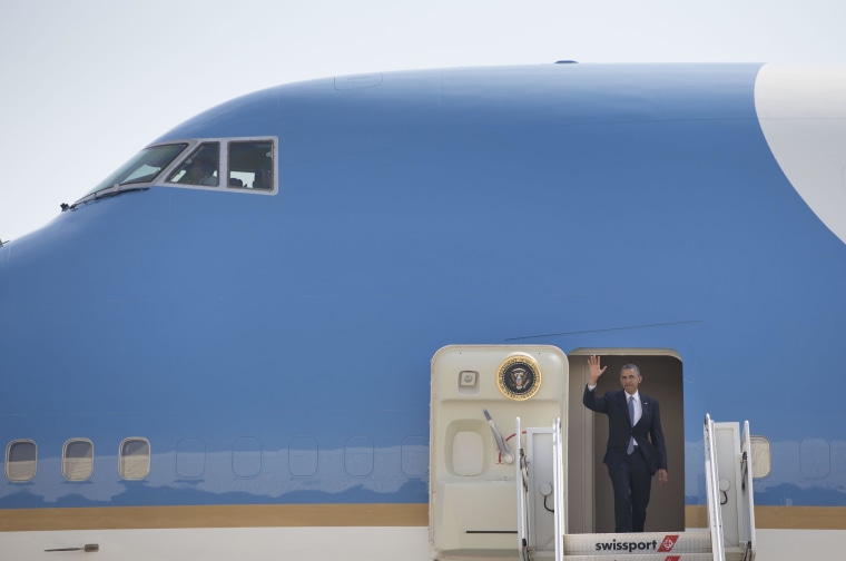 Image: President Barack Obama waves from Air Force One