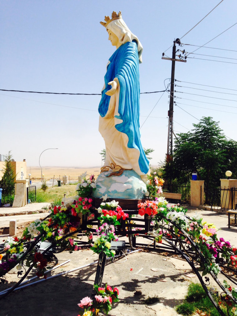 Image: A statue of the Virgin Mary is seen in Al-Qosh, an Assyrian Christian town in northern Iraq, about 30 miles north of Mosul.