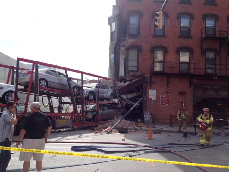 Image: The scene of an accident after a tractor trailer slammed into a restaurant in Ithaca, N.Y.