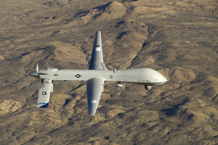Image: A U.S. Air Force MQ-1 Predator unmanned aerial vehicle flies near the Southern California Logistics Airport in Victorville, Calif. on Jan. 7, 2012.