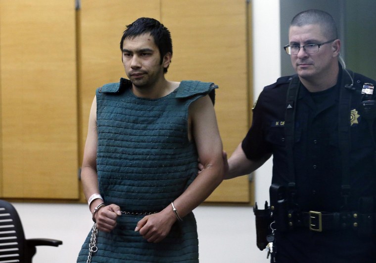 Image: Shooting suspect Aaron Ybarra is led in chains to a court hearing at a King County Jail courtroom on June 6, in Seattle. 