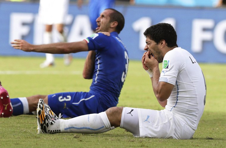 Image: Italy's Giorgio Chiellini claims he was bitten by Uruguay's Luis Suarez