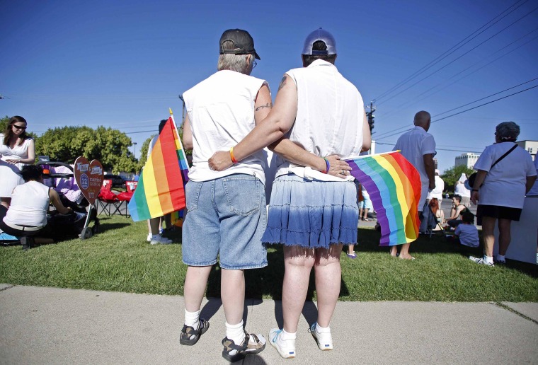 Image: Skinner and her wife Belka wait for the beginning of the Utah Pride Parade in Salt Lake City