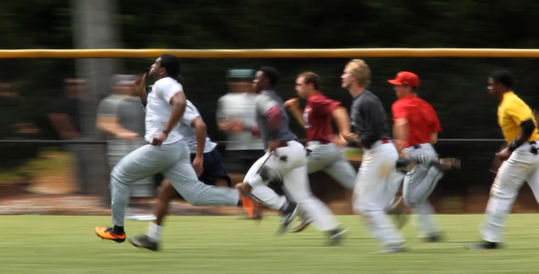 Image: A batch of outfielders run the 60 yards dash.