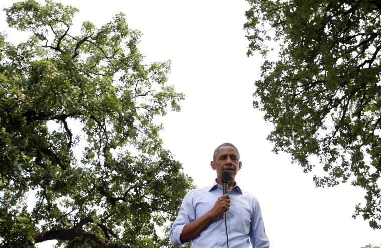 Image: U.S. President Barack Obama thinks before speaking in a town hall meeting at Minnehaha Park in Minneapolis