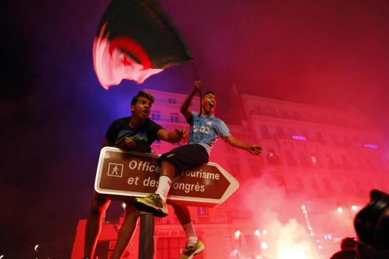 Image: Algerian soccer fans celebrate after their team qualified for the World Cup
