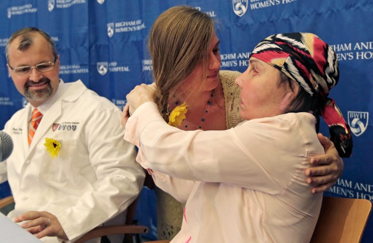 Image: Marinda Righter, center, embraces Carmen Blandin Tarleton