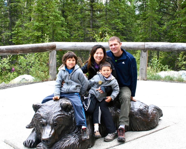 Kurt Dittmar and Christine Wu-Dittmar, with their sons Lukas (6) and Nikolas (9).