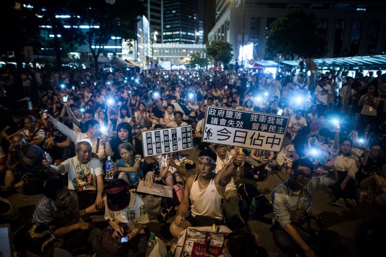 Image: Demonstrators stage a sit-in overnight July 1 in Hong Kong