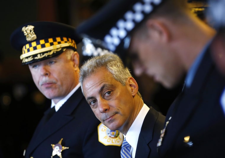 Image: Mayor of Chicago Rahm Emanuel looks over at one of the Chicago Police Department's newest recruits prior to their graduation ceremony for in Chicago