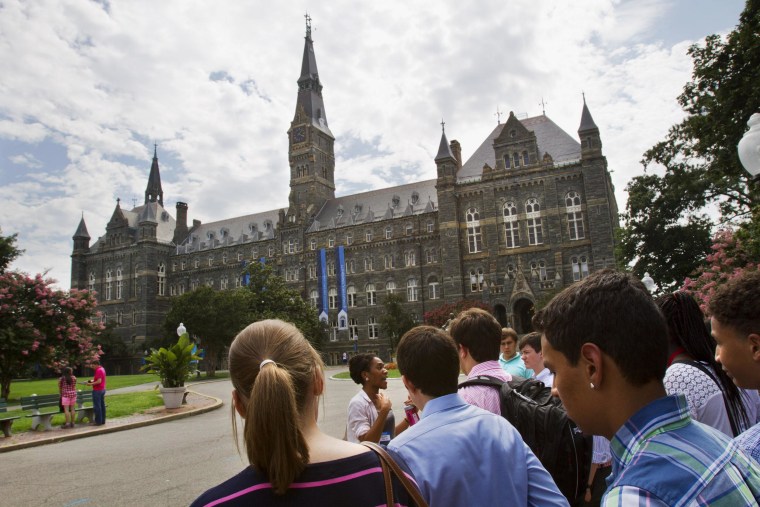 Prospective students tour Georgetown University's campus in Washington.