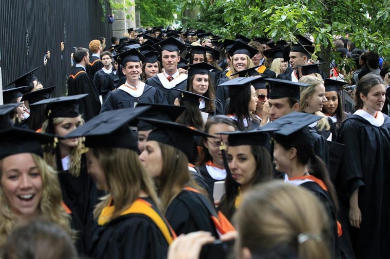 Students who graduate with math and science degrees tend to have higher paying jobs than those in other disciplines, such as the humanities, a survey shows. In this June 5, 2012 photo, friends and family greet a procession of the graduating class of 2012 at Princeton University after commencement ceremonies in Princeton, N.J.