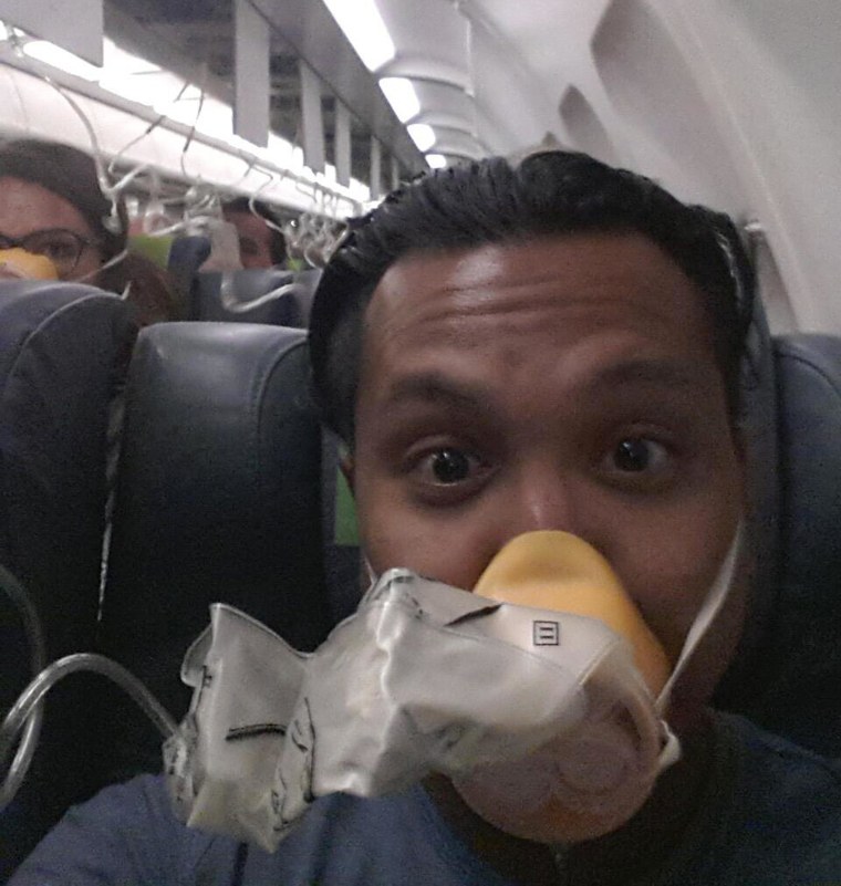 A passenger posted a picture of himself wearing an oxygen mask as a flight from Lisbon to Amsterdam made an emergency landing. Writing on Twitter, he said "So I've been on the worst flight of my life! But I couldn't resist to make a funny selfie!"