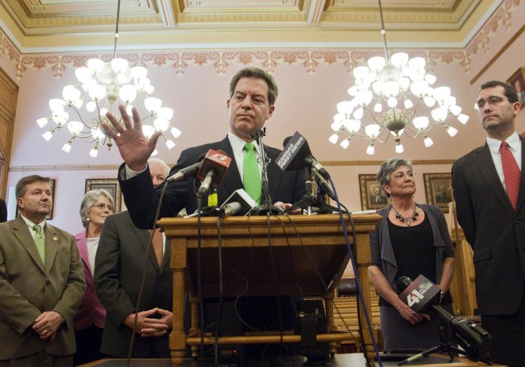 Kansas Gov. Sam Brownback talks during a news conference in Topeka, Kan., on March 7, 2014. 