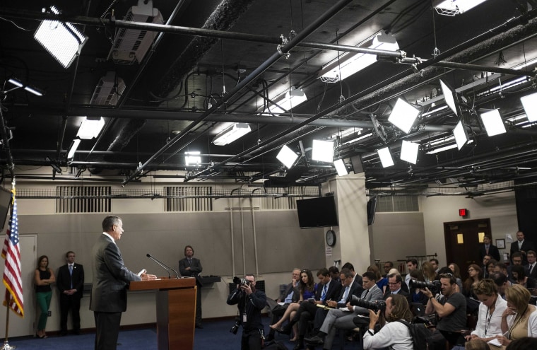 Image: Speaker of the House John Boehner speaks to the media on Capitol Hill in Washington