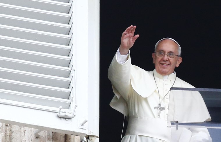 Image: Pope Francis waves as he leads his Sunday Angelus prayer in Saint Peter's square at the Vatican