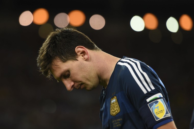 Argentina's forward and captain Lionel Messi reacts after losing the 2014 FIFA World Cup final football match between Germany and Argentina 1-0 following extra-time at the Maracana Stadium in Rio de Janeiro, Brazil, on July 13, 2014. 