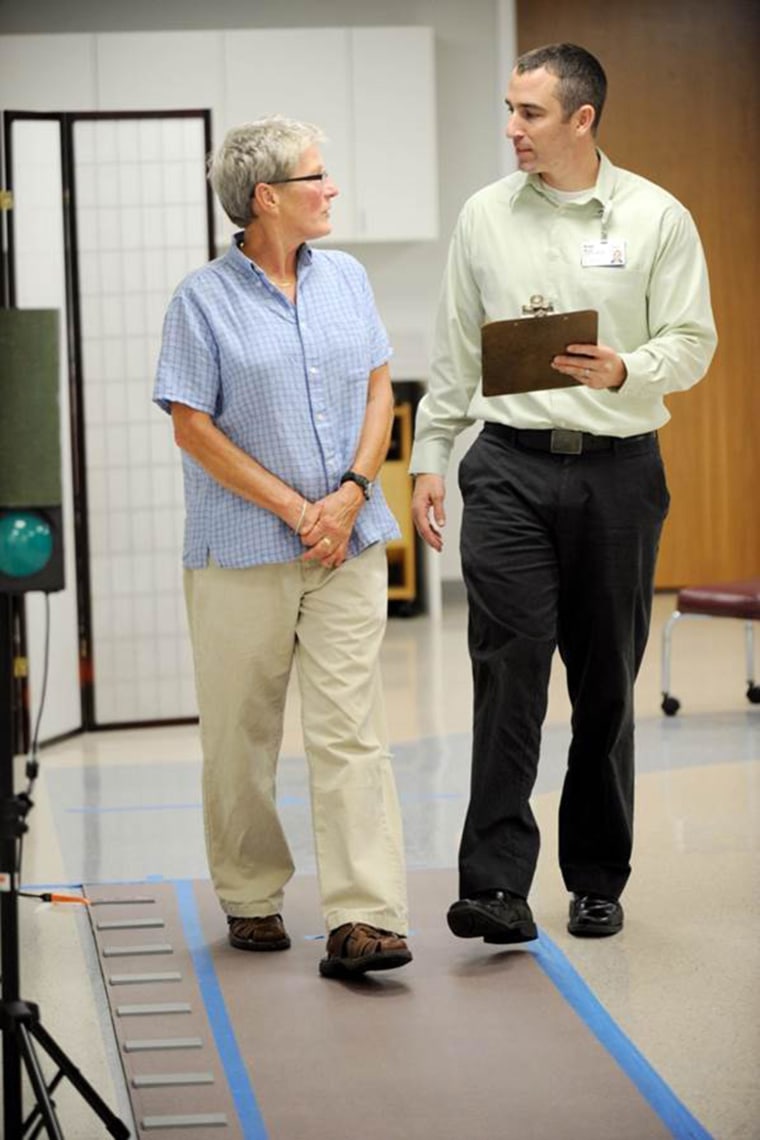 Bradley Manor, PhD performing a gait assessment