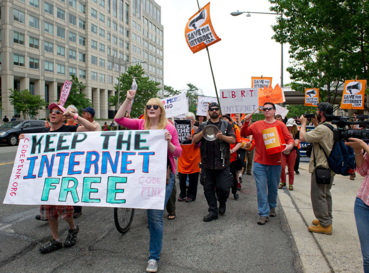Image: Protesters hold a rally to support \"net neutrality\"