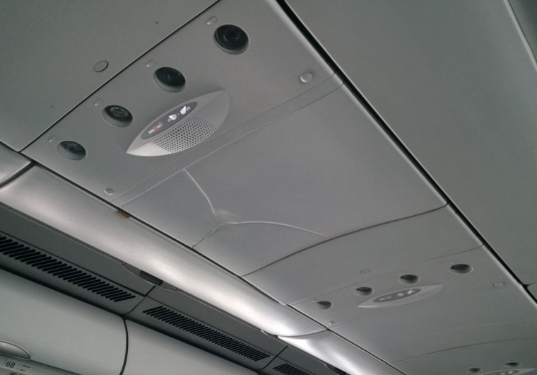 Image: Damage to the interior of a plane after it hit turbulence.