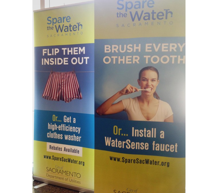 City of Sacramento posters encourage residents to reduce water usage.