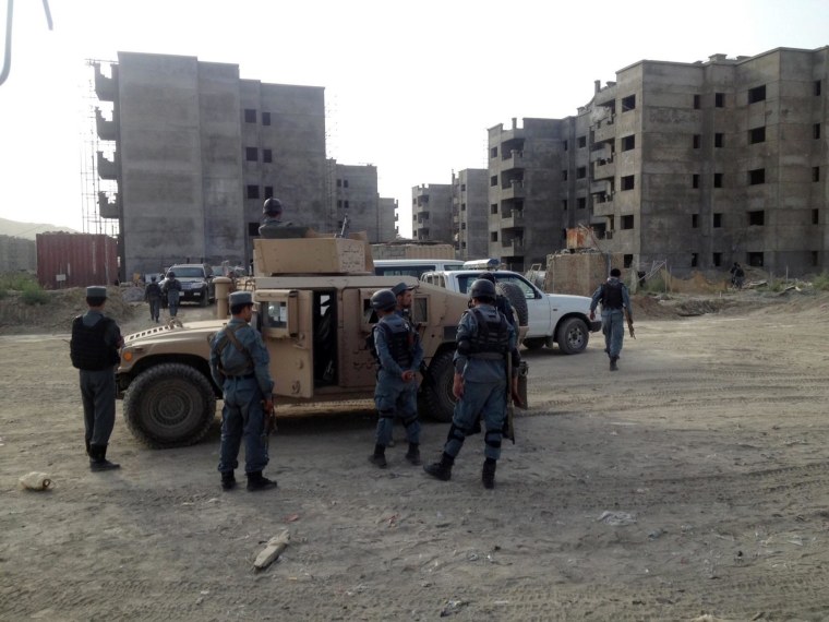 Image: Afghan Police secure the surroundings of Kabul International Airport during a gun battle with suspected militants