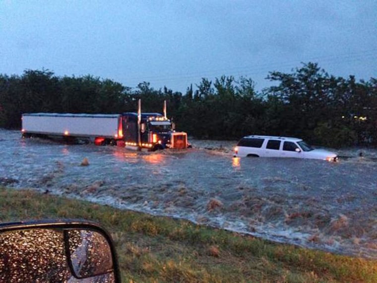 Vehicles stuck in floodwaters on an interstate in north Texas