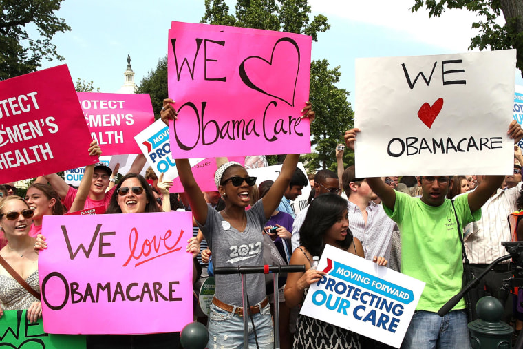 Image: Obamacare supporters react to the  U.S. Supreme Court decision to uphold President Obama's health care law