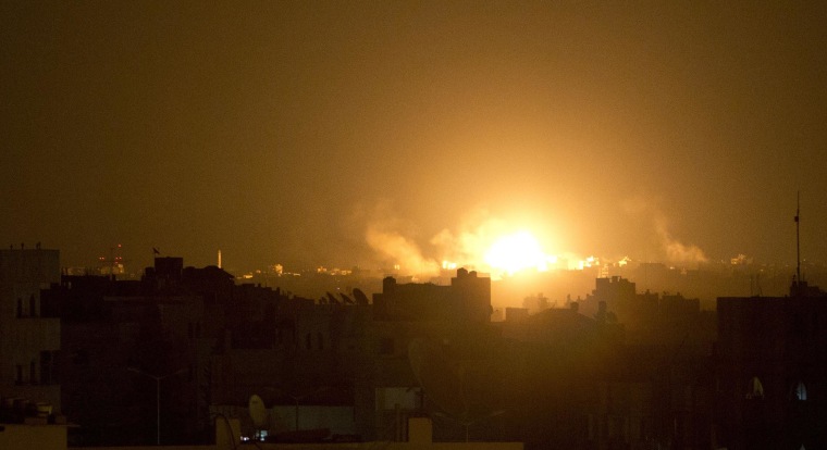 Image: A ball of fire explodes during an Israeli shelling in the eastern part of Gaza City