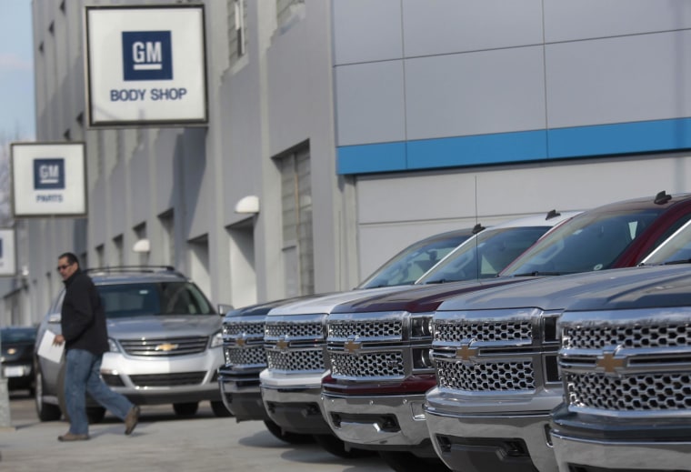 A row of General Motors vehicles at a Chevrolet dealership on Woodward Avenue in Detroit, Michigan