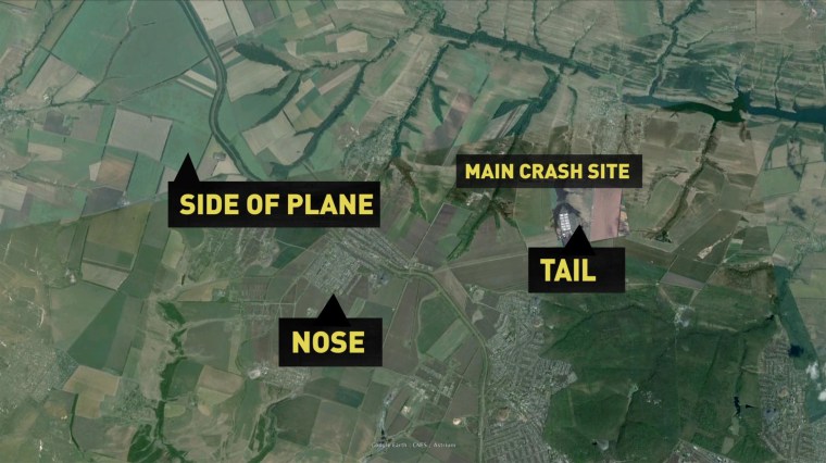 Image: A graphic shows the locations where different pieces of flight MH17 landed.