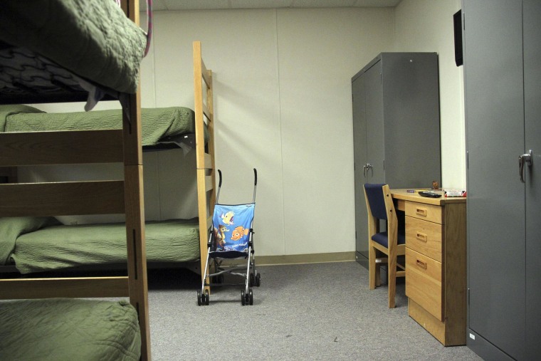 Image: A stroller is seen inside a room in of the barracks for law enforcement trainees turned into immigrant detention center at the Federal Law Enforcement Center (FLETC) in Artesia, N.M.