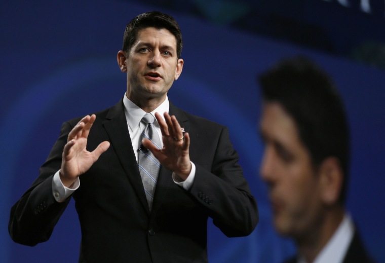 Paul Ryan, U.S. congressman (R-WI), speaks at the SALT conference in Las Vegas in this May 16, 2014 file photograph. Ryan, his party's vice presidential candidate in 2012, is best known for his budget blueprints marked by deep domestic spending cuts. This time, the chairman of the House Budget Committee will unveil his plan to keep social safety net funding at the same levels but change the way it is used in a speech on July 24, 2014, to the American Enterprise Institute, a conservative think tank in Washington. REUTERS/Rick Wilking/Files (UNITED STATES - Tags: BUSINESS POLITICS)