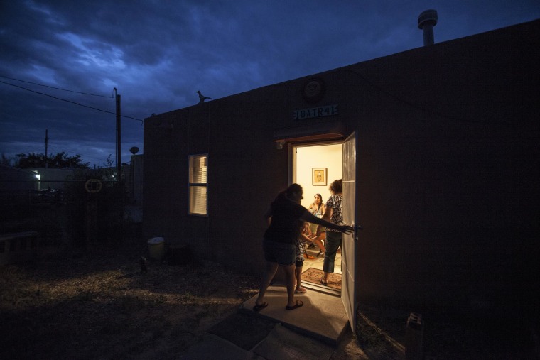 Image: The exterior of Danielle Lucero's traditional pueblo family home where she hosted a feast for Columbia University mentors.