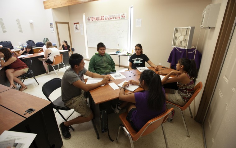 Image: Samantha Piaso, 16, right, participates in a session run by Columbia University students, including Christian White, left, and Fantasia Painter, center, trying to identify pervasive stereotypes of Native Americans during an AlterNATIVE mentoring se