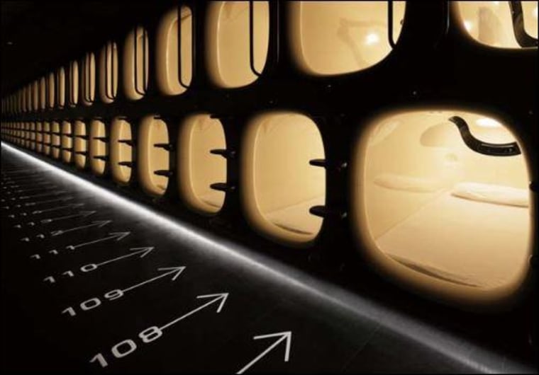 Image: Numbered sleeping pods at the nine hours capsule hotel in Tokyo's Narita Airport.