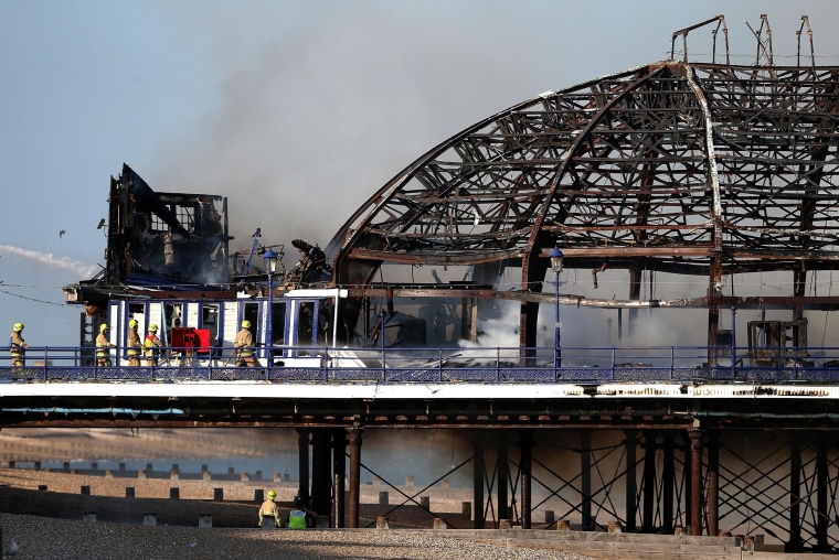 Image: The remains of Eastbourne Pier after a fire broke out in the arcade building in Eastbourne, England.