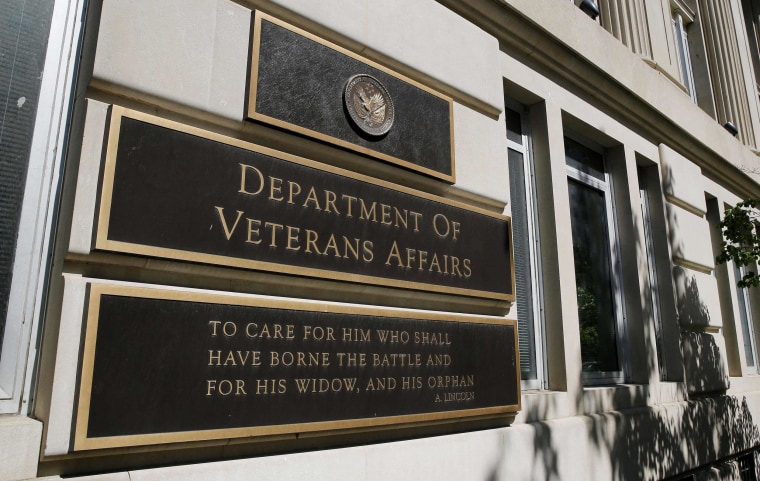 The sign of the Department of Veteran Affairs is seen in front of the headquarters building in Washington, May 23, 2014.      