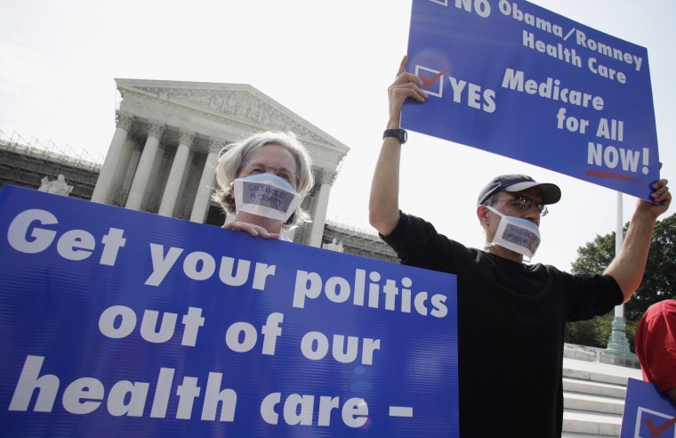Image: Doctors protest against individual mandate in President Obama's health care reform in front of U.S. Supreme Court in Washington