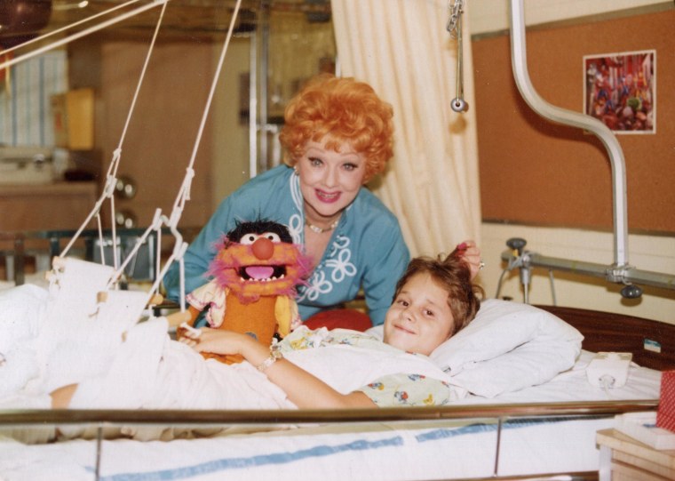 Image: Lucille Ball visits Tony Jacobsen, then 9, at Children's Hospital Los Angeles circa 1980