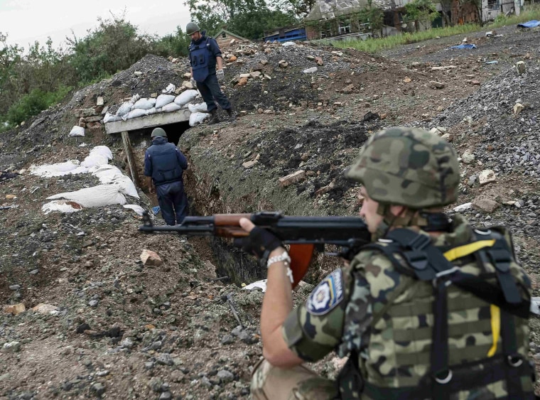 Image: Sappers check positions once held by pro-Russian separatists in Semenovka