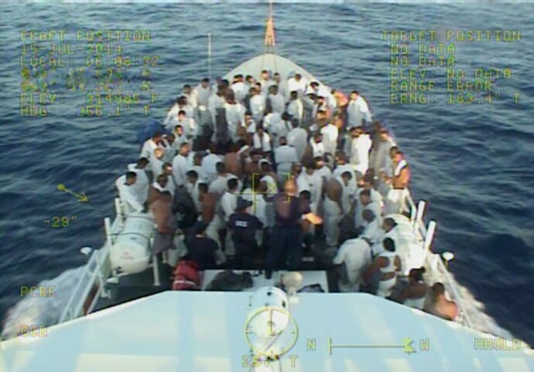 Image: 84 Cuban migrants stand on one of the Coast Guard's new Fast Response Cutters (FRC) in early July. 