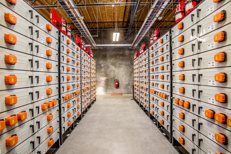 Rows of battery racks are arrayed at Portland General Electric’s Salem Smart Power Center in Salem, Ore. PGE is a participant in the Pacific Northwest Smart Grid Demonstration Project, which is using the center’s 5-megawatt energy storage system to test smart-grid strategies.