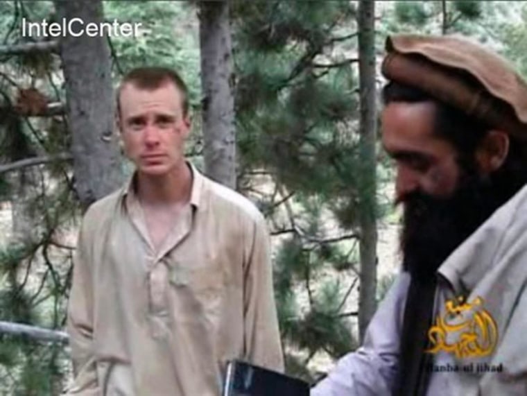 Image: Then-captured U.S. Army soldier Bowe Bergdahl (L) with a Taliban commander (R) in a video released by the Taliban in 2010.