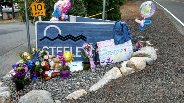 Image: A memorial for Jenise Wright at the entrance to the Steele Creek Mobile Home Park in Bremerton, Wash., where she lived.