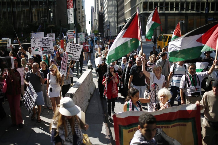 Image: Palestinians march during a protest in New York