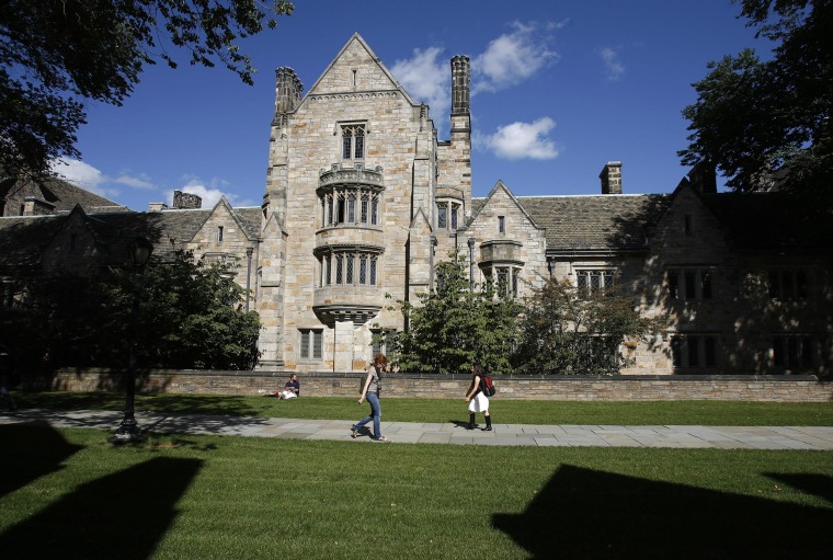 Image: Students walk on the campus of Yale University in New Haven, Connecticut