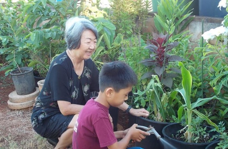 Jenee Odani's mother, Judith Ching, and her son, Nick, at home on Oahu.