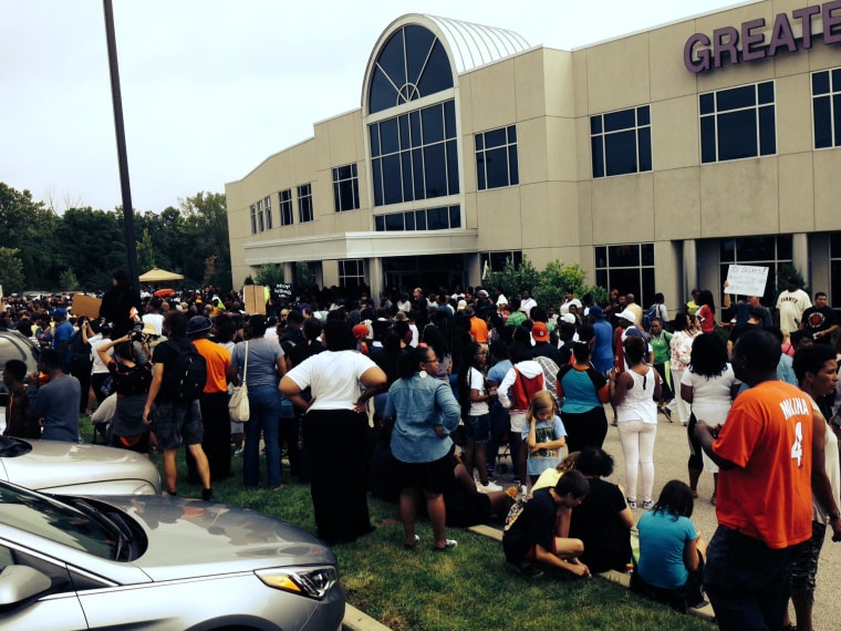 Image: Overflow crowd stands outside the Rally for Justice for Michael Brown in Ferguson
